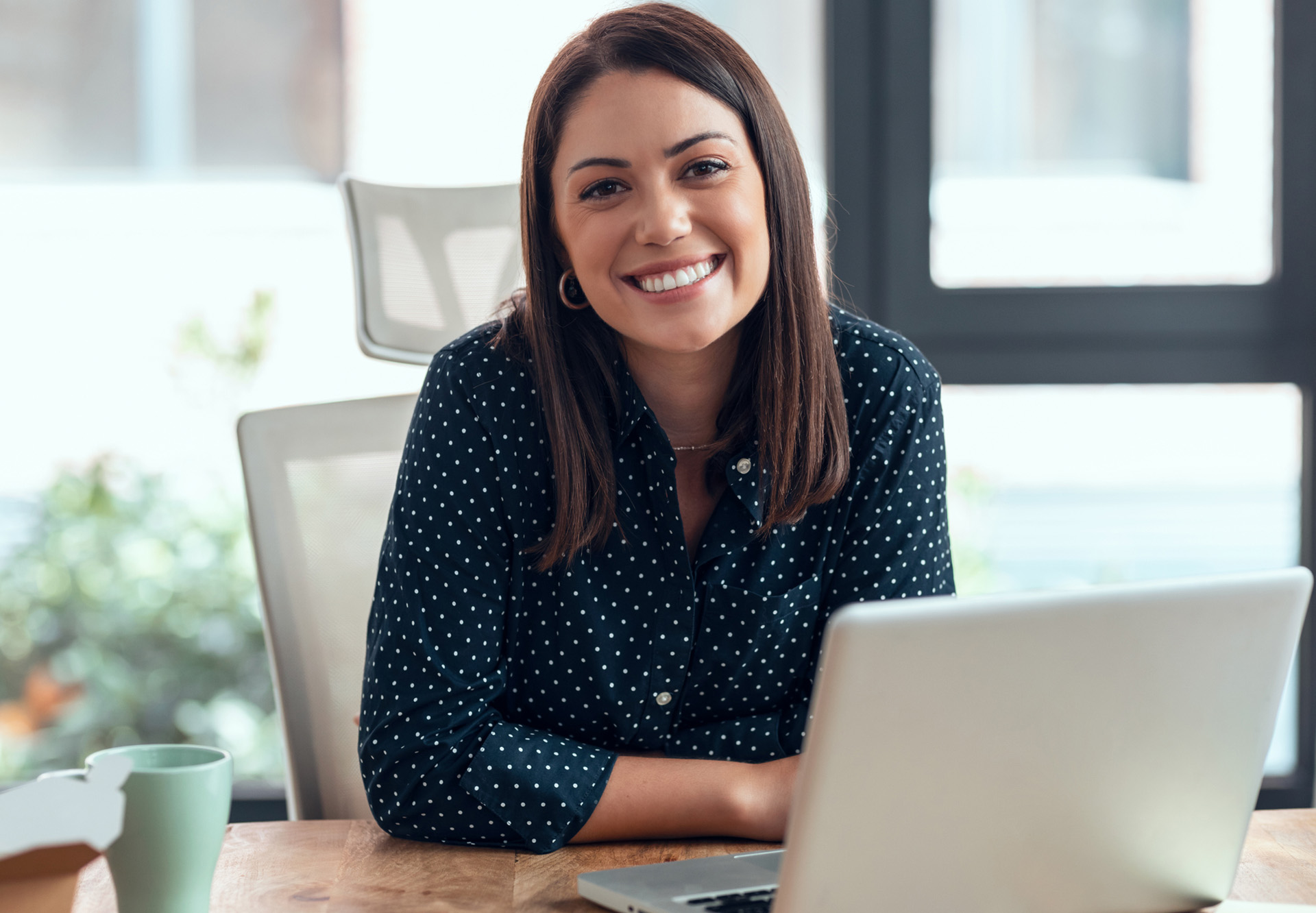 smiling at desk