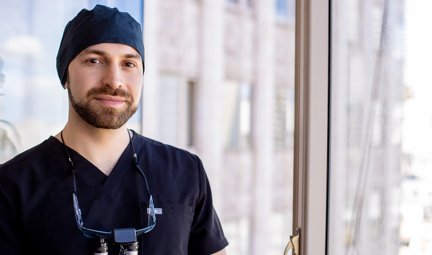 doctor next to window